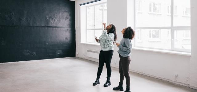 women in a room looking up